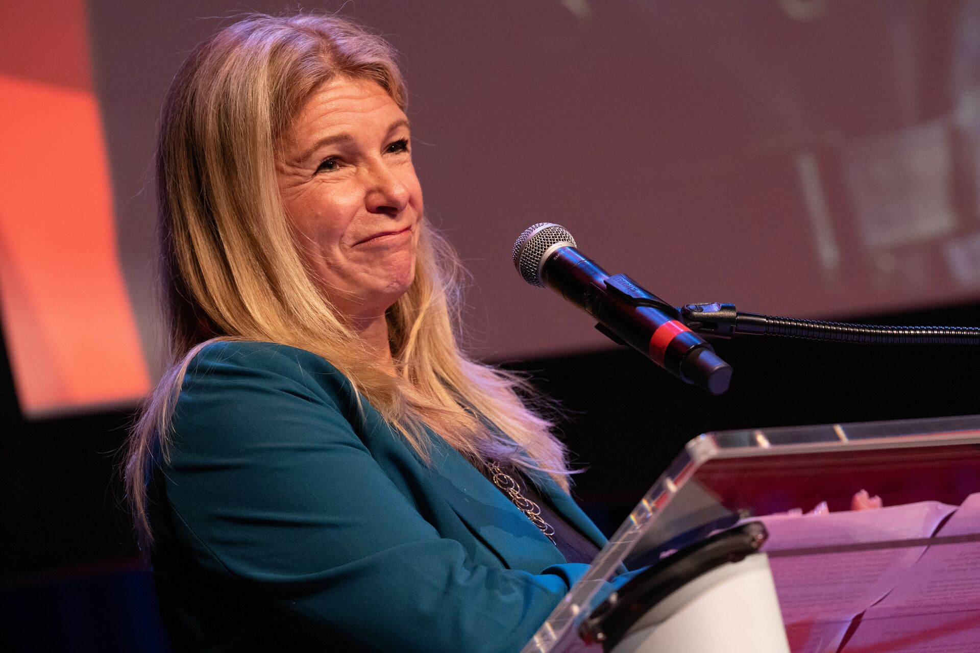 Center's executive director smiling