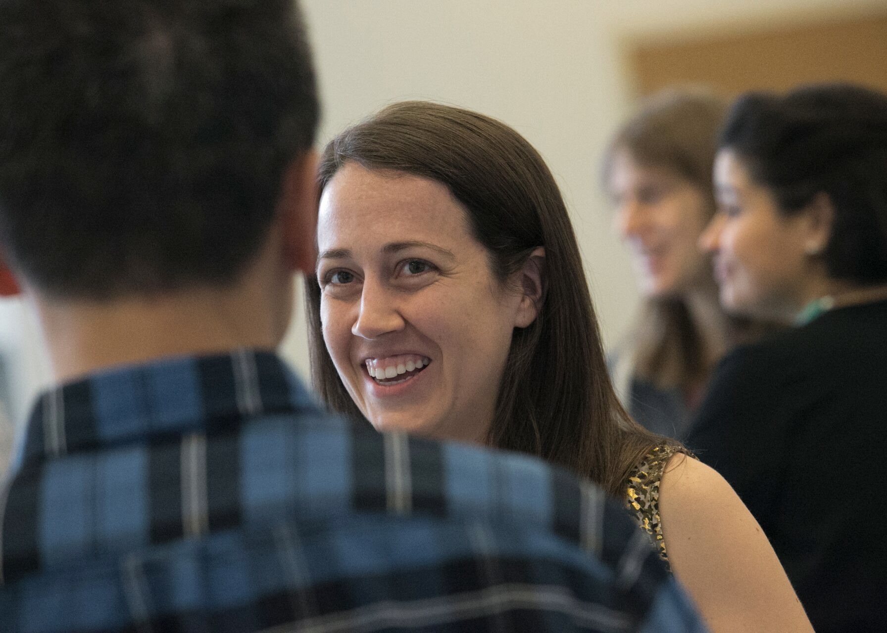 Workshop participant talking and smiling