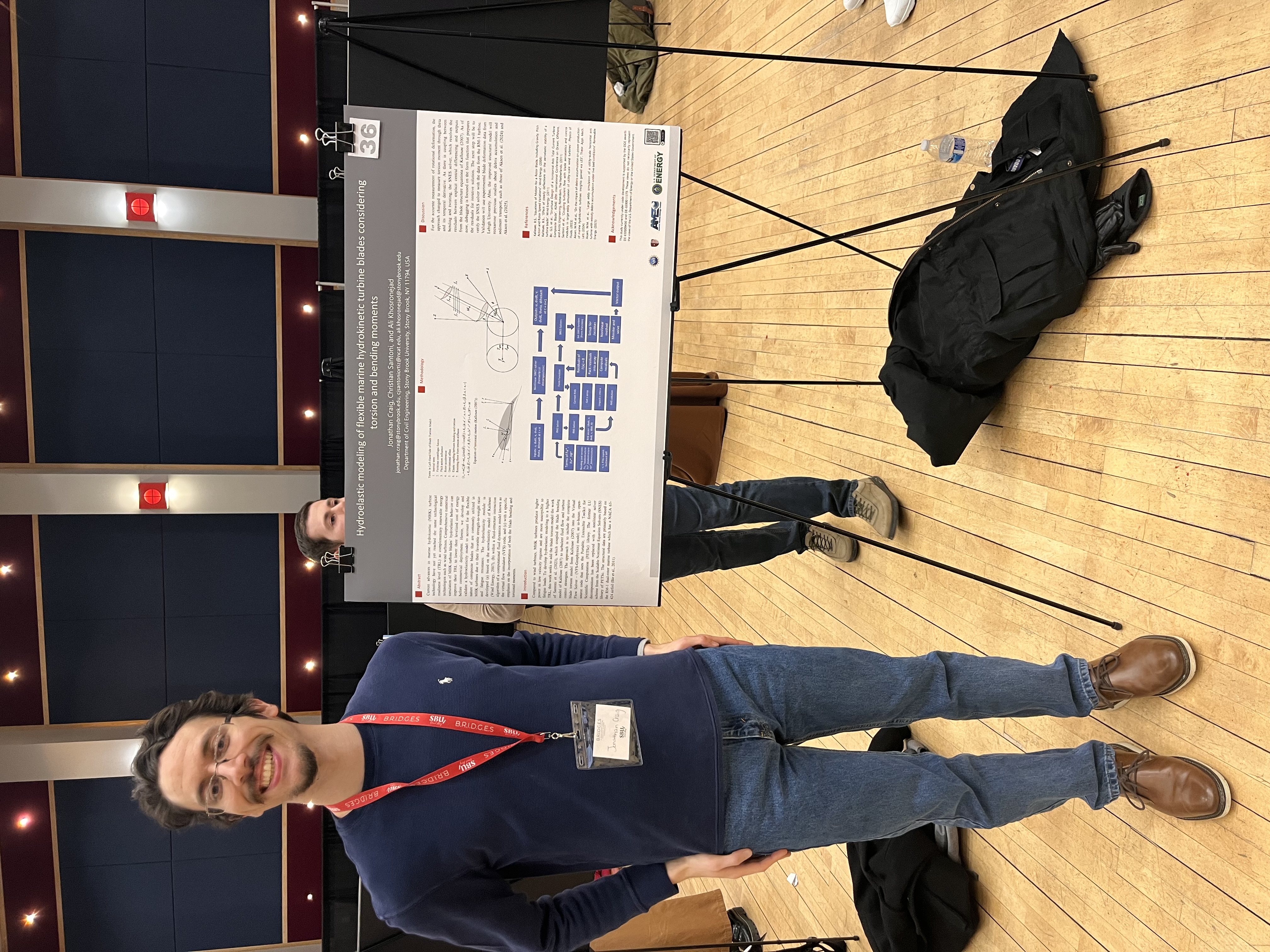 J. Craig with poster