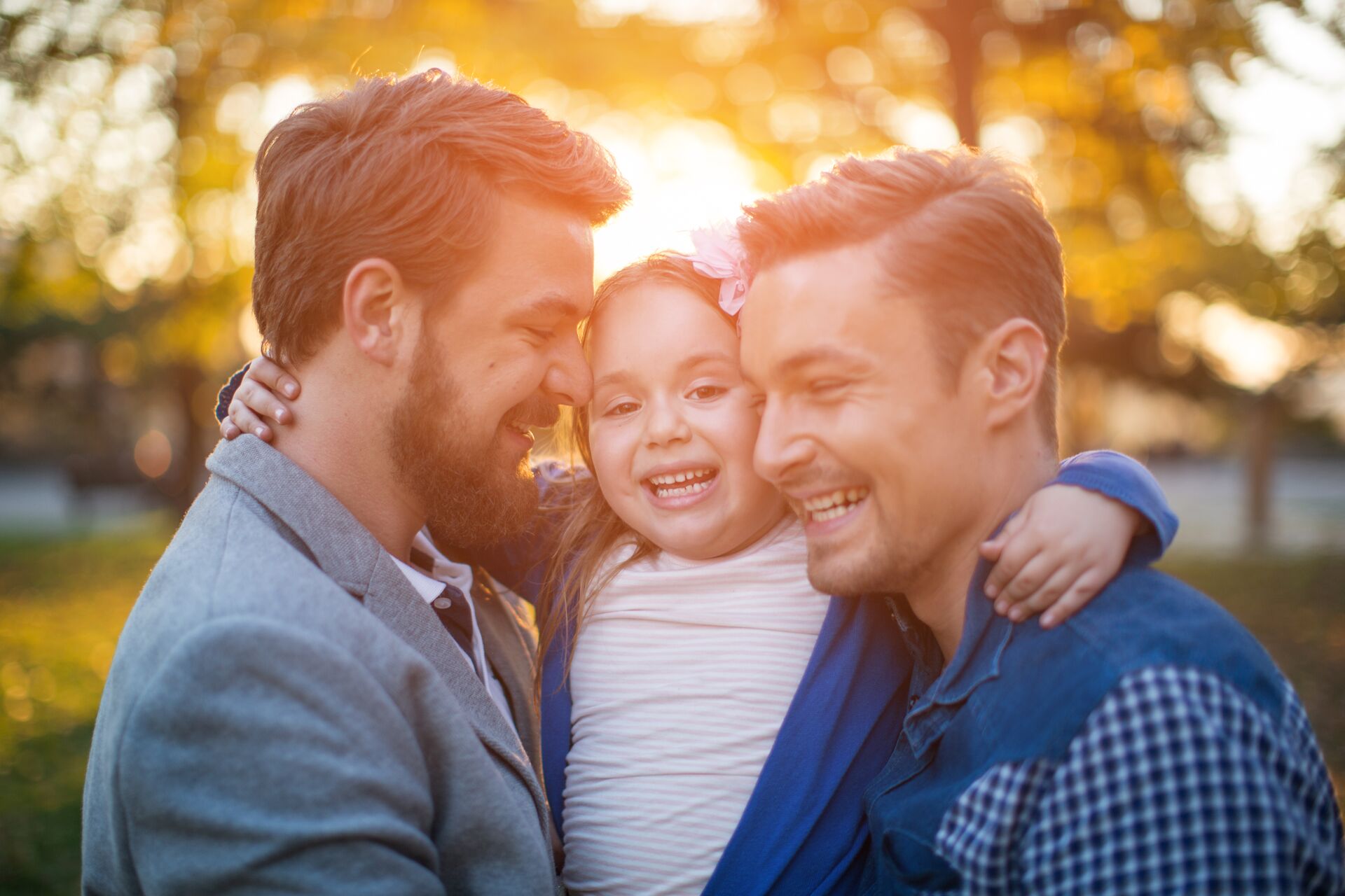 Two dads and their child