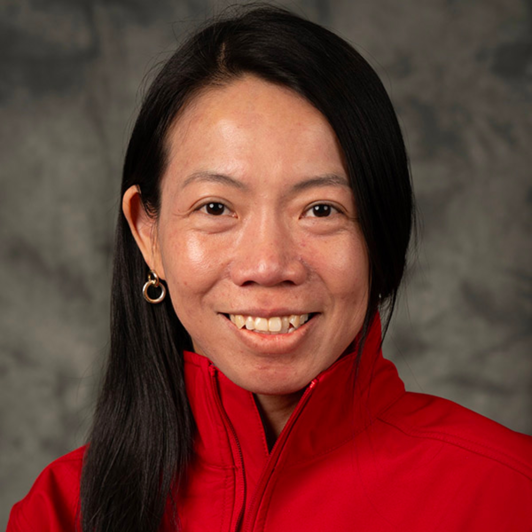 M. Ete Chan wearing a Stony Brook University sweatshirt